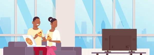 couple eating pizza african american man woman watching tv on couch modern apartment home interior male female cartoon characters portrait flat horizontal banner