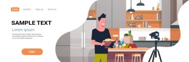 adam gıda blogger kayıt üzerinde kamera adam lezzetli yemek modern mutfak iç blog kavramı erkek karakter portre tam kopyaya alan yatay yemek hazırlama video