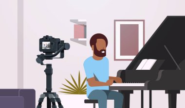 adam müzik blogger kayıt klasik piyano müzik blog kavramı modern daire iç portre portre yatay oynarken kamera Afrikalı-Amerikalı adam video