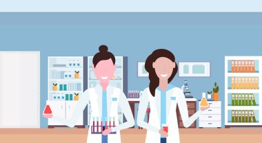 Hastane laboratuvar kadın araştırmacılar test tüpleri işyeri Ofis mobilya tıbbi klinik laboratuvar iç portre portre yatay tutarak çalışma çift kadın bilim adamları