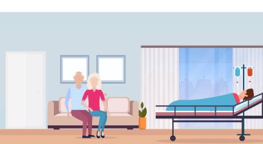 Çift yatak yoğun terapi ward hastane oda iç modern tıp Kliniği yatay yatan kadın ziyaret hasta adam adam