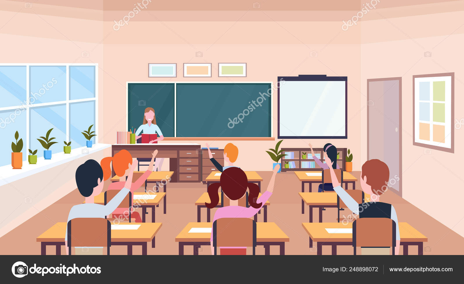 Pupils Raising Hands To Answer Question Teacher Sitting Desk