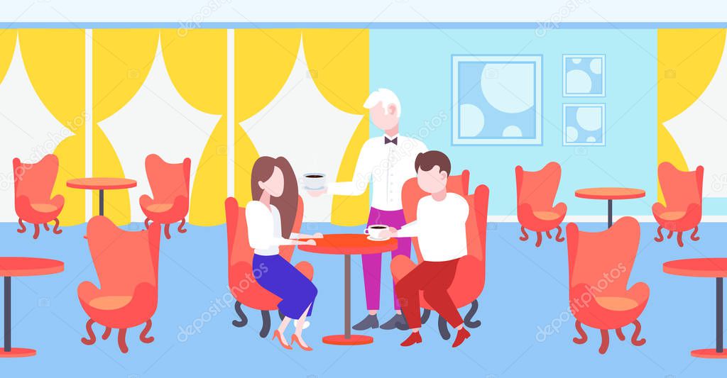 waiter serving coffee to visitors couple sitting at restaurant table modern cafe interior staff hospitality concept horizontal flat full length