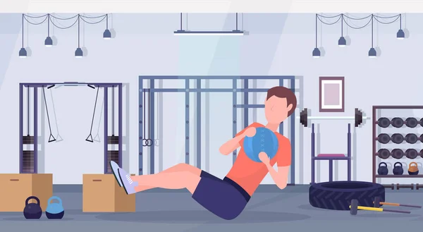 Desportivo homem fazendo sit-ups exercícios com medicina couro bola cara formação cardio treino conceito moderno ginásio saúde estúdio clube interior horizontal comprimento total — Vetor de Stock