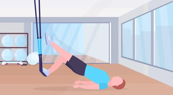 Homme sportif faisant des exercices avec suspension sangles de remise en forme élastique corde gars entraînement crossfit concept d'entraînement moderne gymnase studio intérieur horizontal plat pleine longueur — Image vectorielle