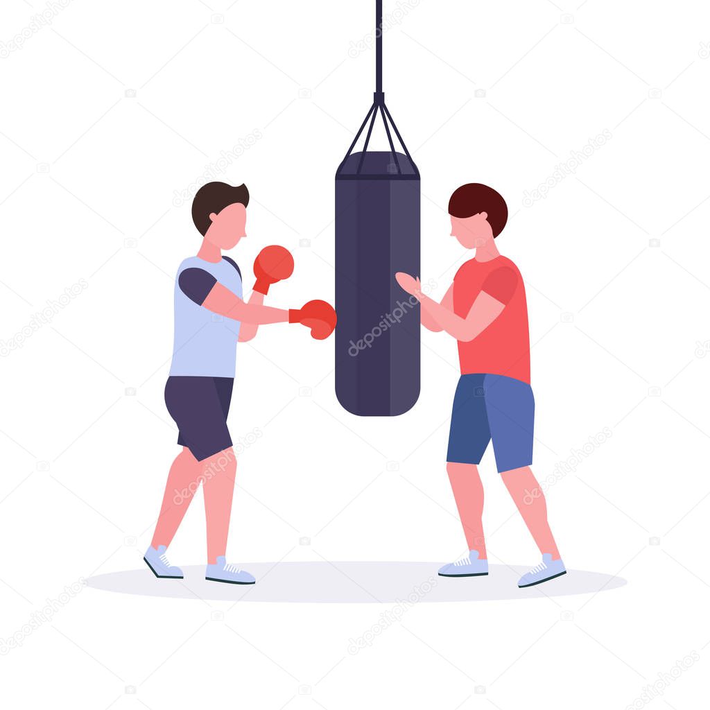 man boxer with personal trainer hitting punching bag in red boxing gloves guy fighter training workout fight club healthy lifestyle concept flat white background