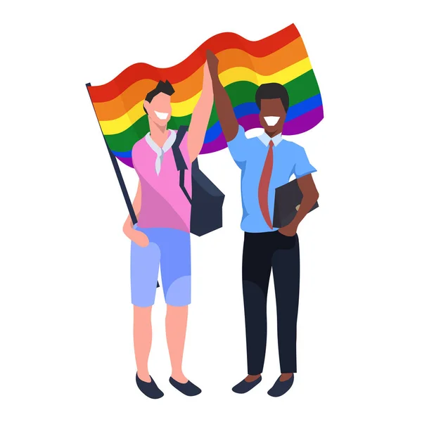 Mix race couple gays holding lgbt rainbow flag love parade pride festival concept two smiling guys standing together male cartoon characters full length flat — Stock Vector