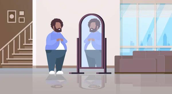 Triste hombre con sobrepeso mirándose a sí mismo reflejo en espejo afroamericano sobre tamaño chico abotonamiento camisa estilo de vida poco saludable obesidad concepto moderno apartamento interior plana longitud completa horizontal — Vector de stock