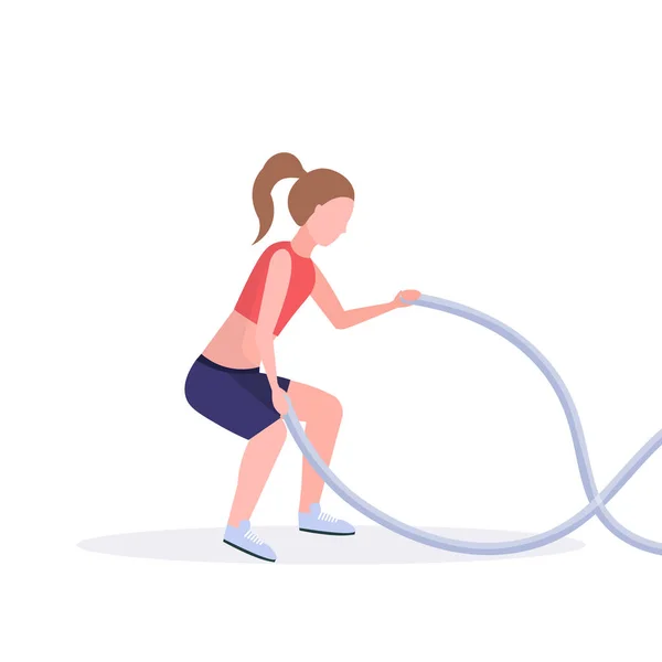 Спортивна жінка робить кросфіт вправи з бойовою мотузкою дівчина тренування в тренажерному залі кардіо тренування здоровий спосіб життя концепція плоский білий фон повної довжини — стоковий вектор