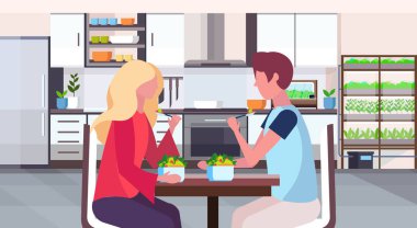 Modern adam bitki büyüyen düz ev iç kavramı kadın masa mutfak meyve salata sağlıklı sistem taze yatay yiyecek çift