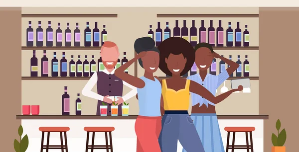 African american girls taking selfie photo on smartphone camera people relaxing in bar drinking cocktails barman serving clients modern cafe interior flat horizontal portrait — Stock Vector