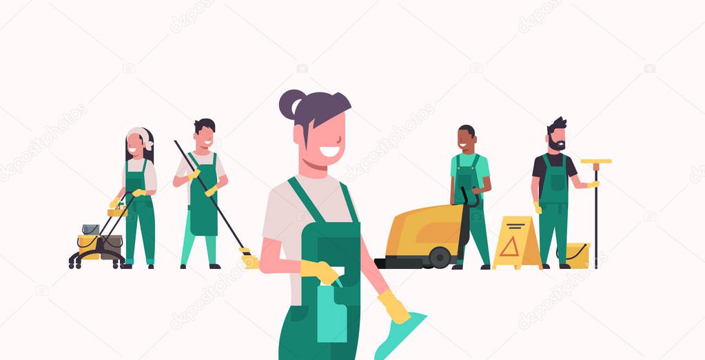 janitors team cleaning service concept male female cleaners in uniform working together with professional equipment flat full length horizontal