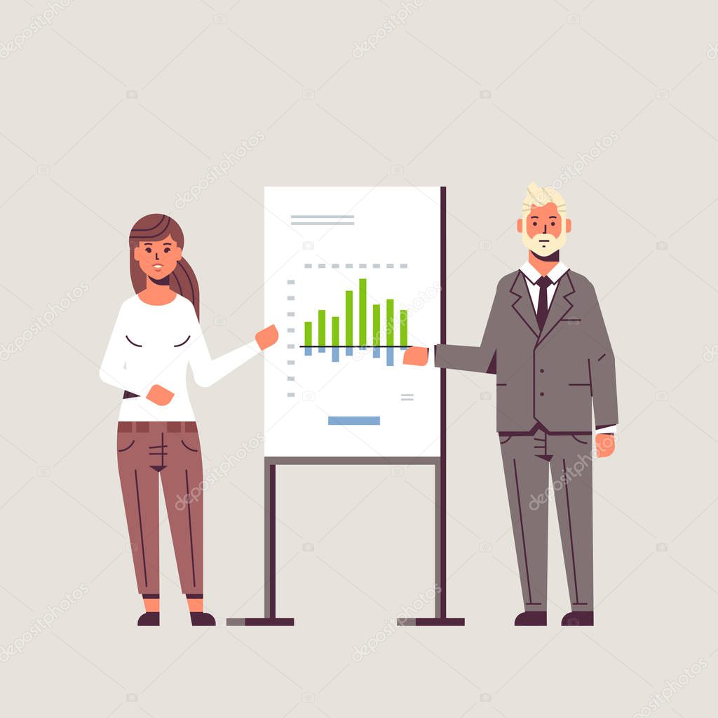 businesspeople coworkers presenting financial graph on flip chart board business couple man woman at seminar making presentation concept speakers on conference meting flat full length