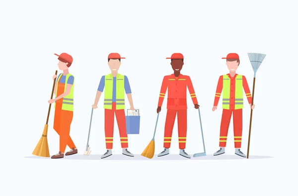 Men street cleaners in uniform holding different tools mix race male workers standing together cleaning service concept flat full length white background horizontal vector illustration — Stock Vector