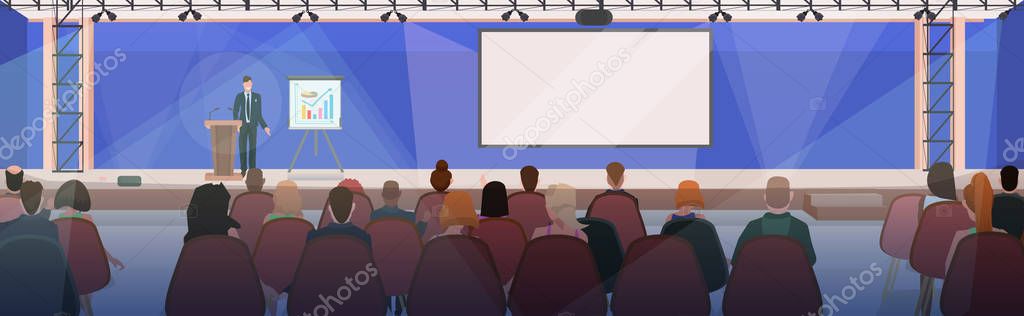 businesspeople at business meeting with businessman talking from tribune modern conference hall with board and flip chart boardroom interior horizontal flat