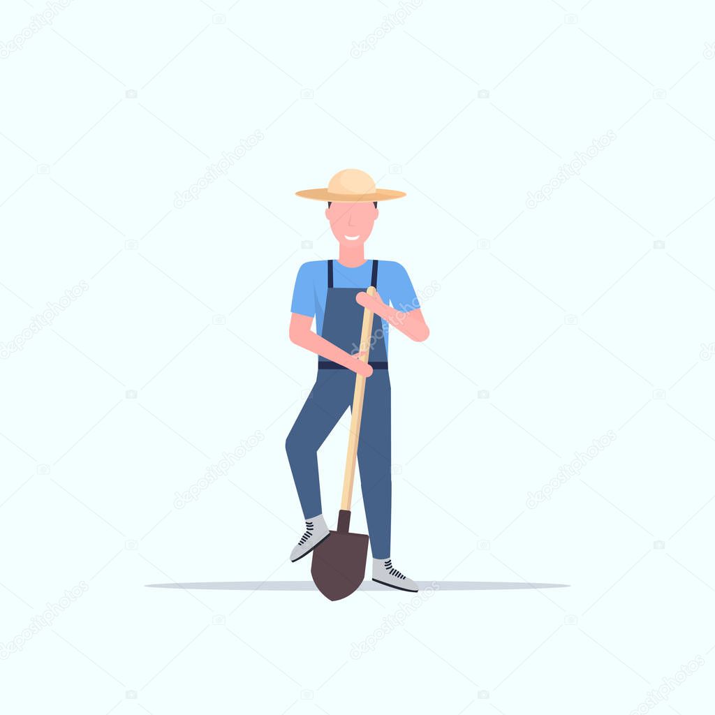 gardener holding shovel smiling country man working in garden gardening eco farming concept full length flat