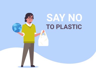 adam tutan gezegen ve polietilen çanta hiçbir plastik kirliliği geri dönüşüm ekoloji sorunu toprak kavramı erkek eko aktivist tam uzunlukta düz yatay kaydetmek demek