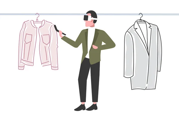 Homem vestindo óculos 3d segurando cara controlador experimentando realidade virtual escolher roupas através de fone de ouvido compras on-line aumentada conceito de tecnologia digital plana comprimento total horizontal —  Vetores de Stock