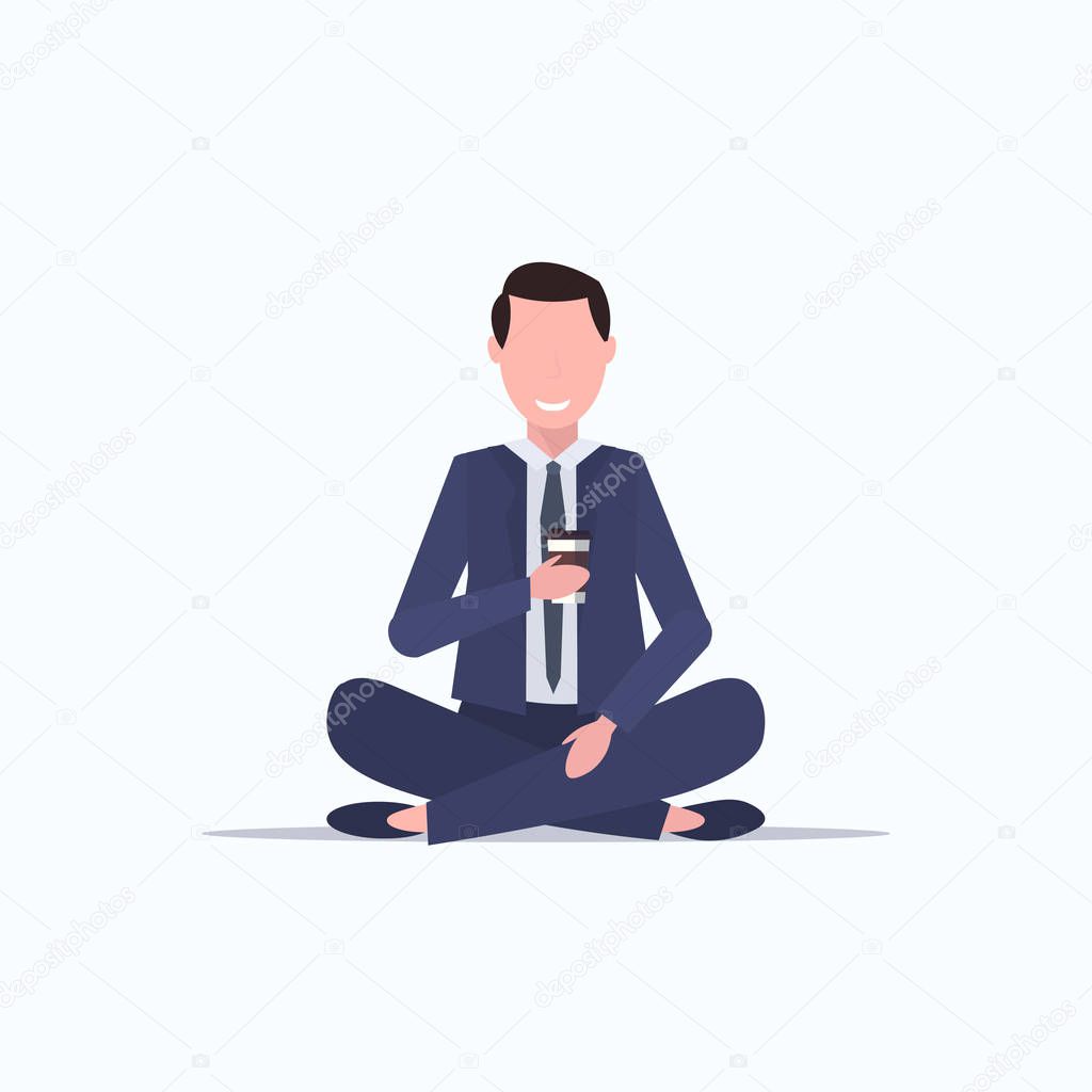 businessman sitting lotus pose young business man drinking coffee relaxation concept flat full length