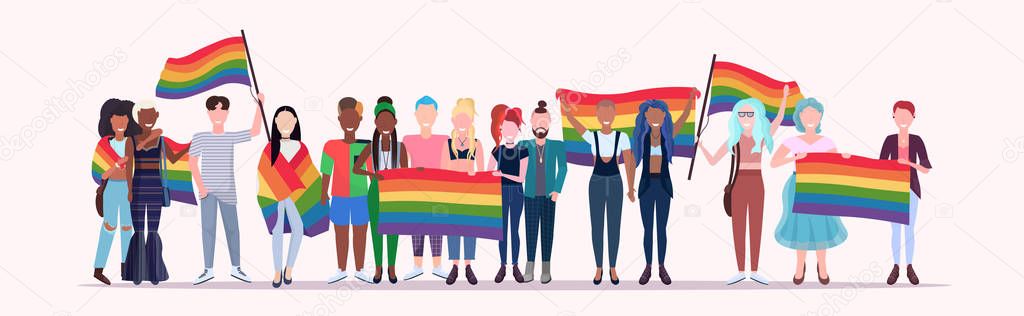 people group holding rainbow flag lgbt pride festival concept mix race gays lesbians crowd celebrating love parade standing together full length flat horizontal