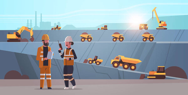 engineers using radio and tablet workers controlling professional equipment working on coal mine extraction industry mining transport concept opencast stone quarry background flat horizontal