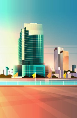 şehir silueti modern gökdelenler çit ve nehir karşı cityscape günbatımı arka plan düz dikey
