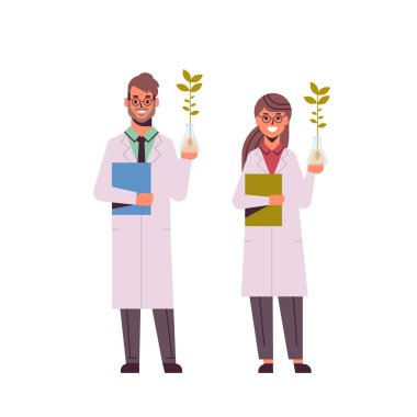 bilim adamları çift test tüpleri erkek kadın genetik laboratuvar araştırma bilim kimyasal kavramı tam uzunlukta düz deneyler yaparak bitki örneği inceleyerek