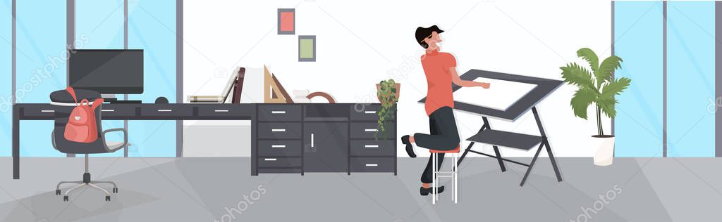 male designer using adjustable board man planning project engineering concept modern office draftsman studio interior flat full length horizontal
