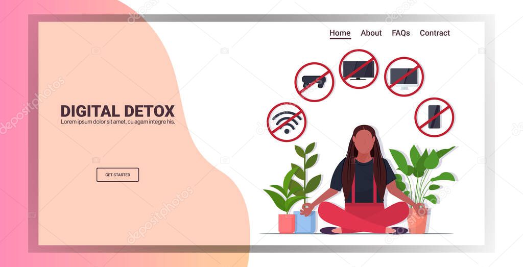 woman sitting lotus pose gadgets in red prohibition signs digital detox rest from devices concept