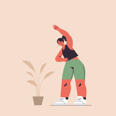 Sporcu kadın egzersiz yapıyor kız antrenman yapıyor sağlıklı yaşam tarzı spor konsepti geliştiriyor.