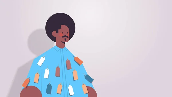 Hombre afroamericano con etiquetas de colores en el concepto de discriminación racial de la desigualdad de desgaste — Vector de stock