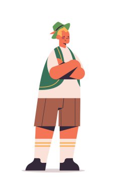 Geleneksel Alman kıyafetleri giyen adam. Oktoberfest parti konsepti. Elleri bağlı, uzun süre eğlenen adam.