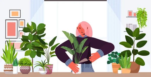 Kvinna plantera krukväxter i potta hemmafru vårda sina växter porträtt — Stock vektor
