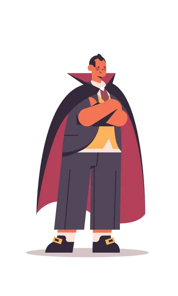 Lindo hombre de pie en traje de Drácula feliz fiesta de Halloween concepto de celebración — Vector de stock