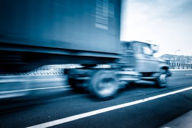 motion truck go through the tunnel.