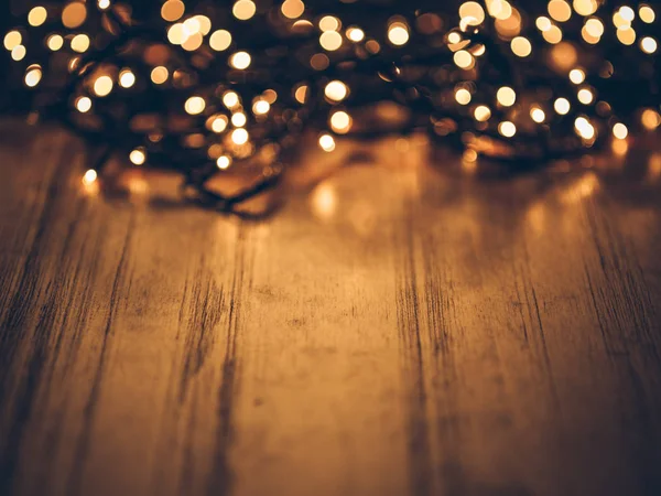 Luces Hadas Navidad Una Mesa Madera Tiro Estudio —  Fotos de Stock