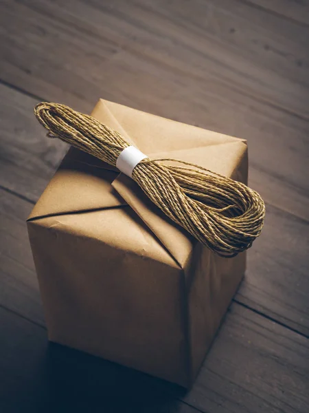 Brown Cube Box Bundle String Isolated Wooden Table — Stock Photo, Image