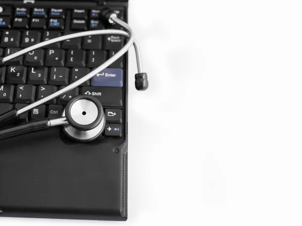 Elektronische Medizin Stethoskop Auf Laptop Tastatur — Stockfoto