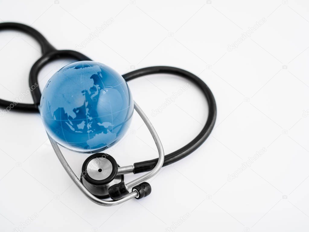 Electronic medical, stethoscope on Laptop blue toned images.