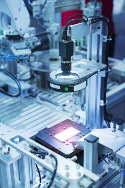 Zenginlik fabrikasındaki robotik görüş sensör kamera sistemi