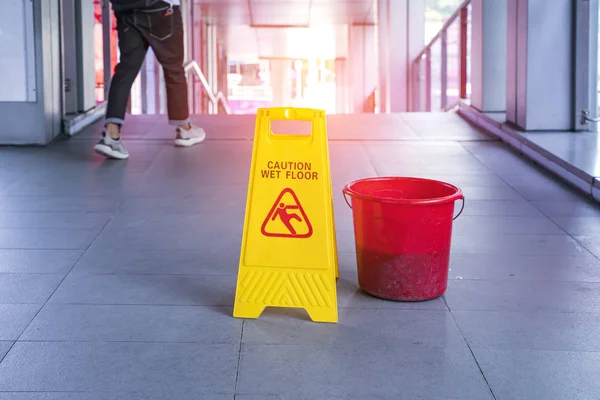 Yellow Caution Wet Floor Sign Wet Floor Red Bucket — Stock Photo, Image