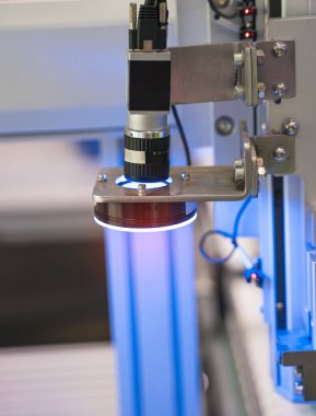 Zenginlik fabrikasındaki robotik görüş sensör kamera sistemi