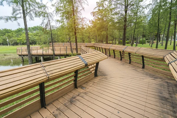 Wooden bridge and park background — Stock Photo, Image