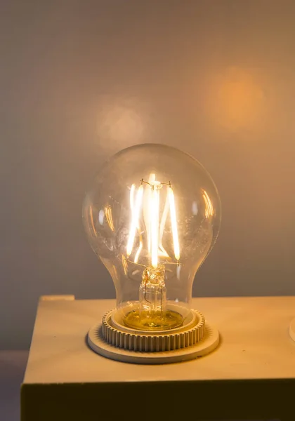 Edison light bulb on port — Stock Photo, Image