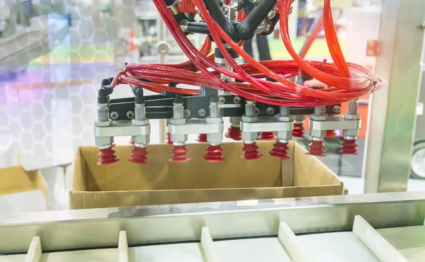 robotic and pneumatic piston sucker unit on industrial machine,a