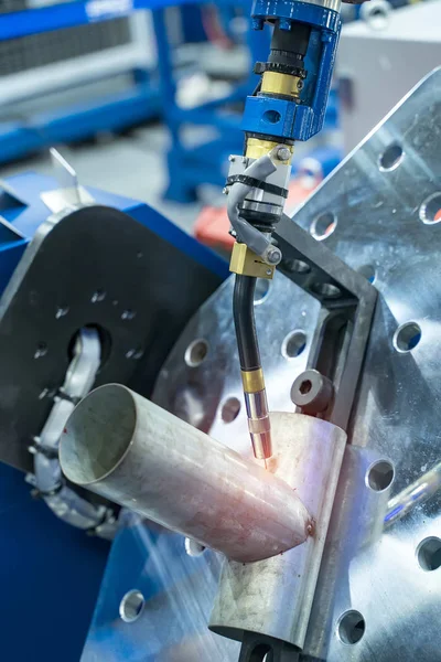 Robotic Welding Machine in a Metal Manufacturing Plant