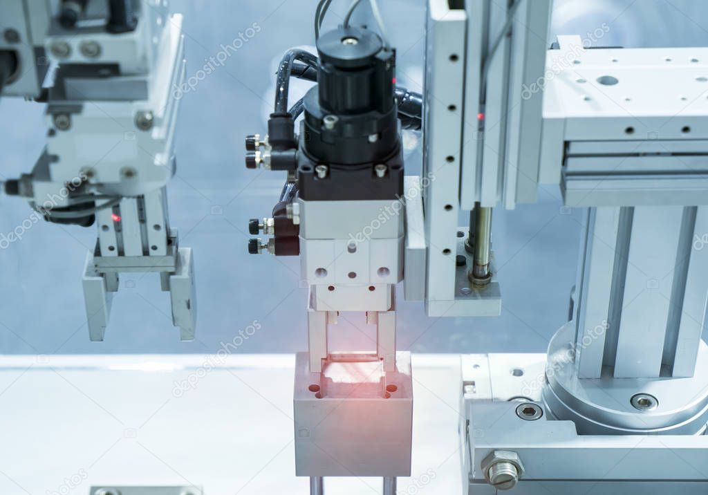 robotic and pneumatic piston unit on industrial machine,automati