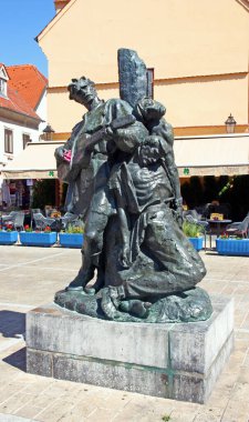 ZAGREB, CROATIA - 28 Temmuz 2020 Petrica Kerempuh heykeli, edebiyat figürü, Dolac, Zagreb, Hırvatistan 'ın yanındaki küçük bir meydana yerleştirildi