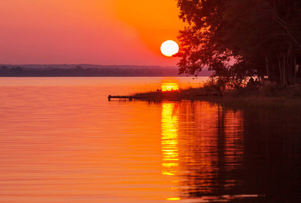 Sunset scene at the lake Peten Itza, Guatemala. Central America.