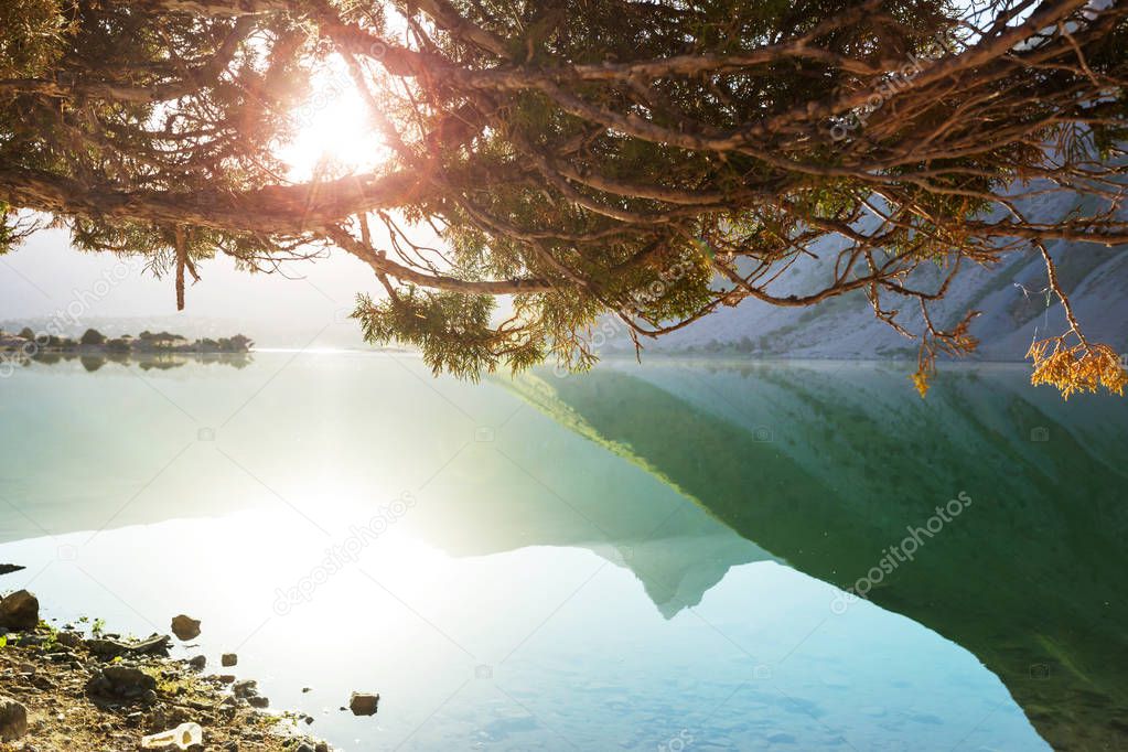 Beautiful serene lake in  Fann mountains (branch of Pamir) in Tajikistan.